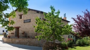 A stone building with a sign that reads "HOTEL". - Casa Rural Aranaratxe for 8 people (Aranarache)