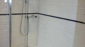 Bathtub, hair dryer, towels