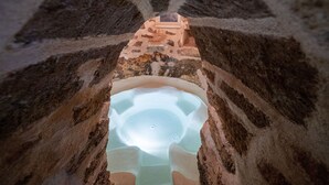 A stone structure with a central basin and a small platform on top. - Puglia Salento luxury villa with swimming pool and hydro spa. a few km from leuca  (alessano)