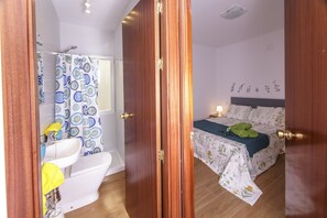 Bathtub, hair dryer, towels