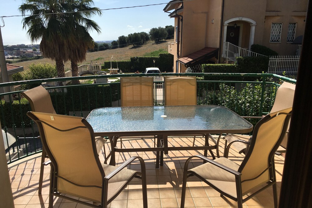 Holiday home in peaceful location with large terrace and stunning sea views.