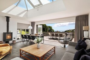 TV, fireplace - Amber Cottage - Hot Tub, Sea Views and Log Burner (Saundersfoot)