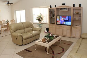 Télévision, lecteur de DVD, livres