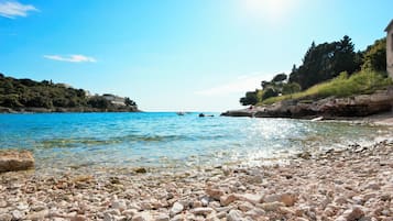 Beach nearby, sun loungers