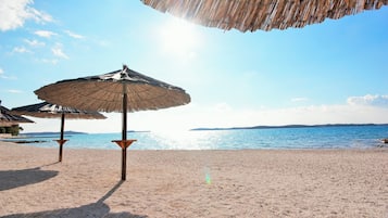 Beach nearby, sun loungers