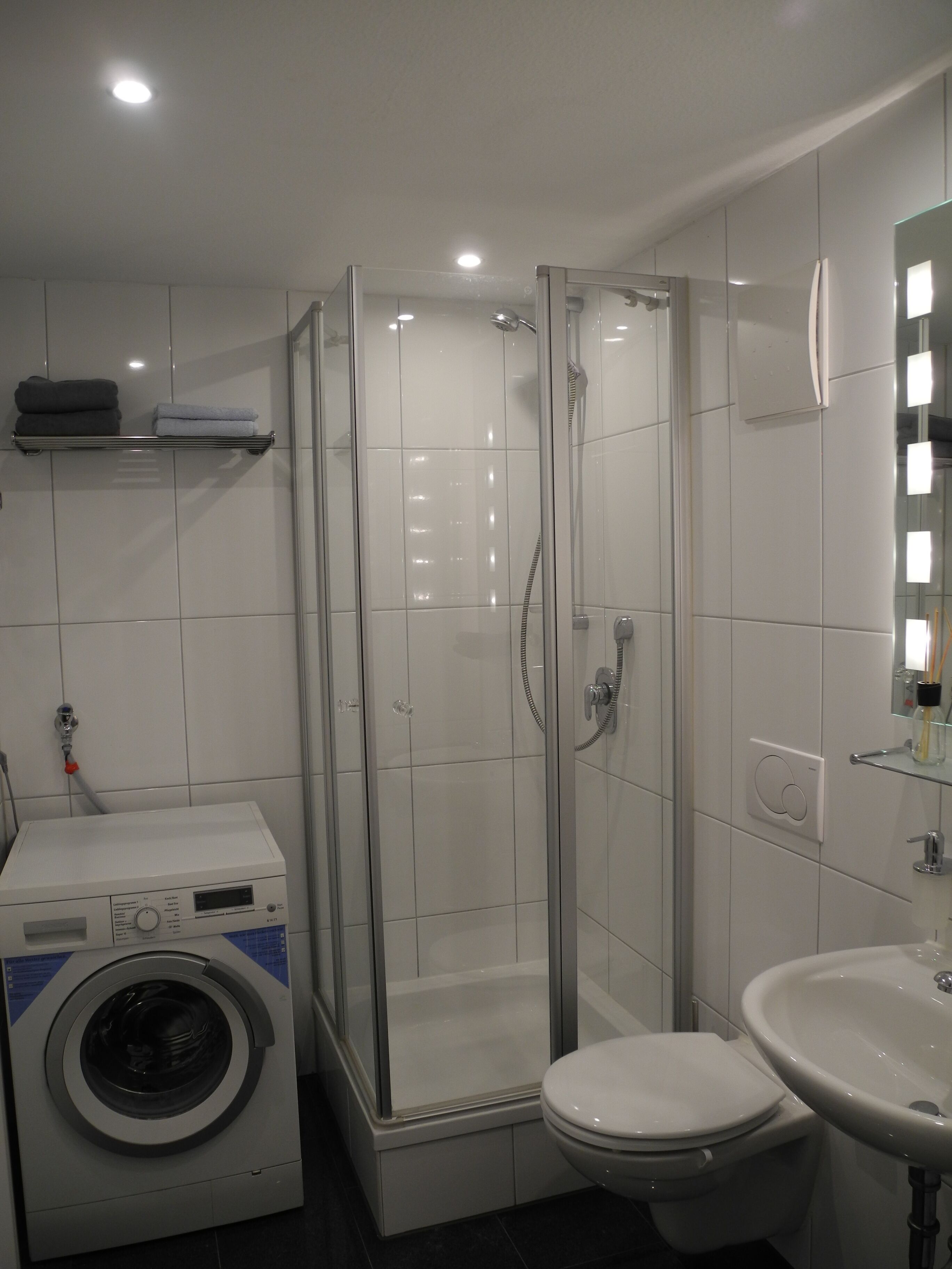 Bright modern apartment in a quiet location with its own entrance and patio