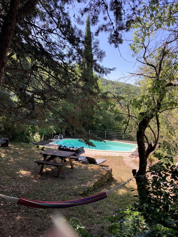 Outdoor pool, a heated pool - Restored 17th century sheepfold with large grounds and private pool (Nant)