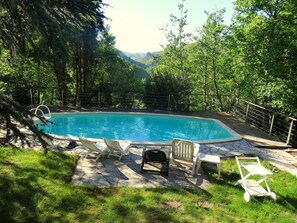 Outdoor pool, a heated pool - Restored 17th century sheepfold with large grounds and private pool (Nant)