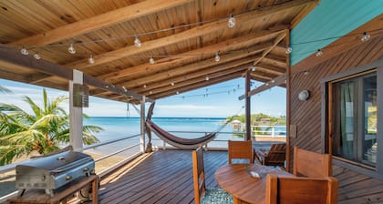 2BR Beach House Dolphin Views DAILY From LARGE DECK A/C Utilities INCL.