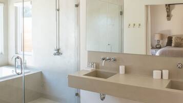 Bathtub, hair dryer, towels, soap