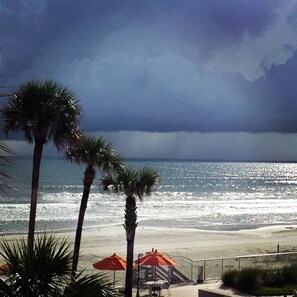 On the beach, sun-loungers, beach towels