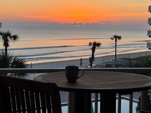 Outdoor dining - Beachfront Living • Stunning Ocean Views from Balcony and Great Room. (New Smyrna Beach)