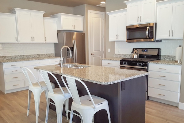 Kitchen with bar seating.