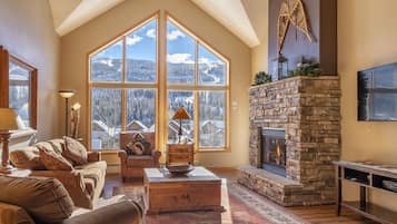 Flat-screen TV, fireplace, video games, DVD player