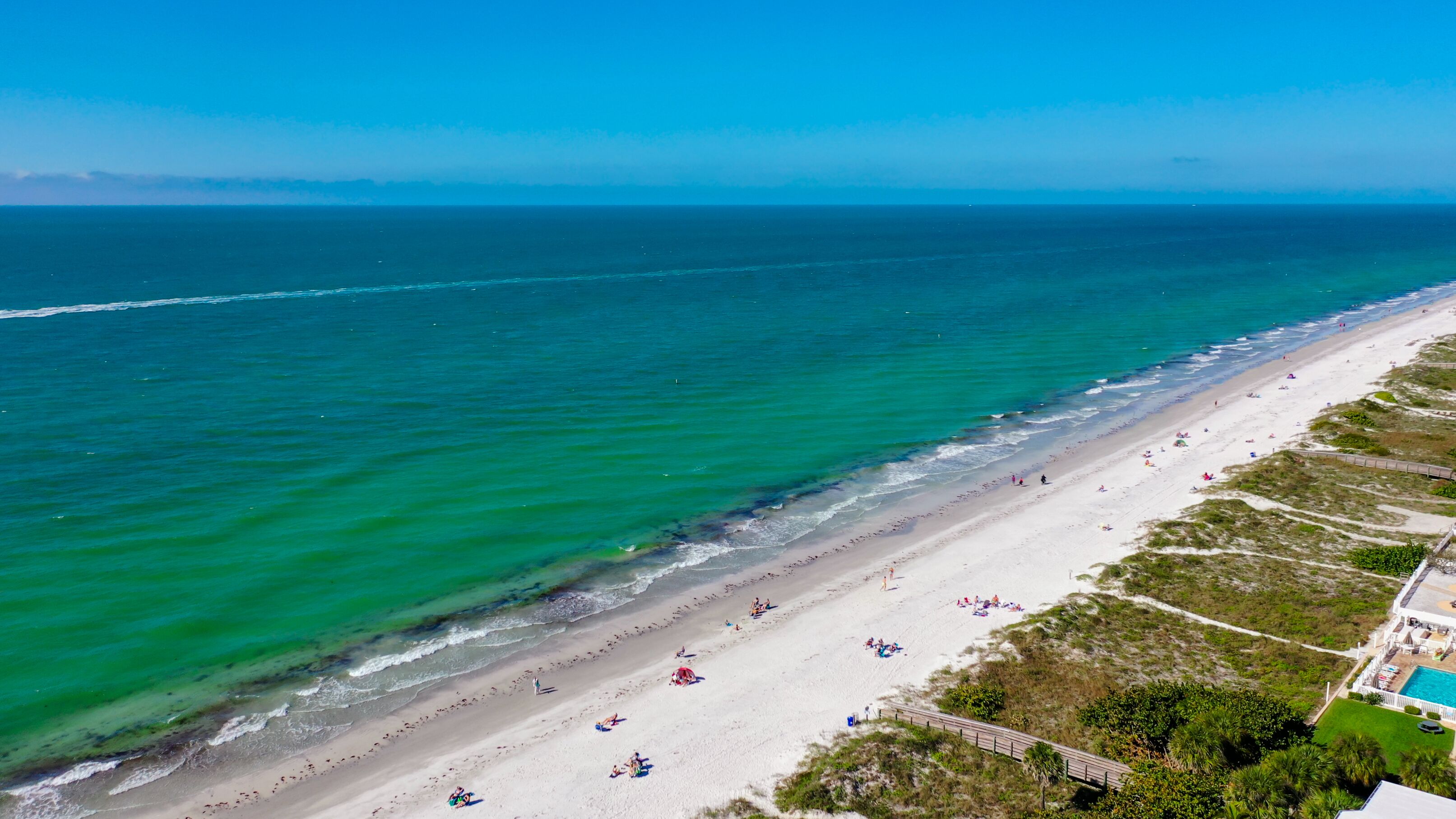 On the beach, sun-loungers, beach towels