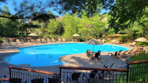 RENOVATED- Ski in&out /Walk to village/ Corner Unit/Heated pool/ Sunny/Views/AC