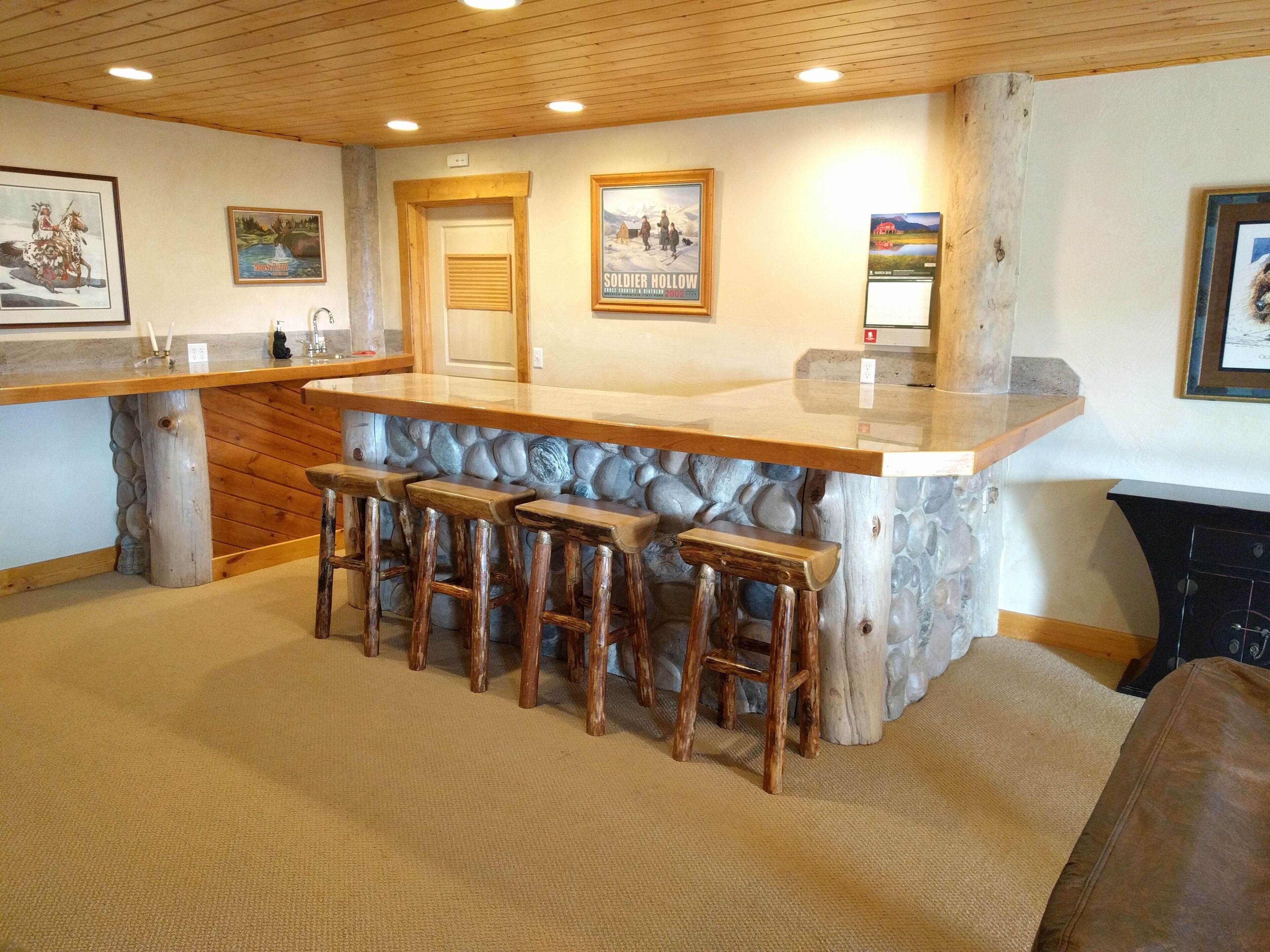 Custom log home nestled in the mountains. Stunning valley views from every room.