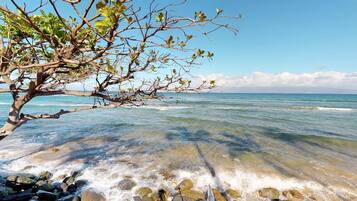 On the beach, sun loungers, beach towels
