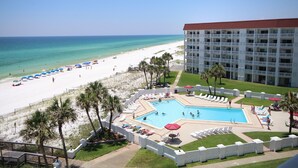 A hotel with a pool, beach, and ocean view. - El Matador 362 -  FREE TICKETS!! Your stay includes free tickets to many area attractions! (Fort Walton Beach)