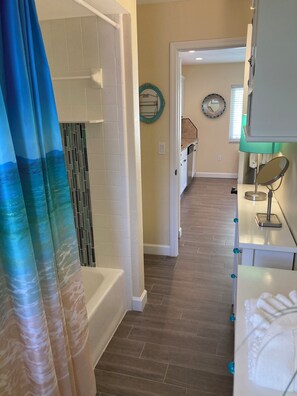 Combined shower/tub, hair dryer, towels, soap