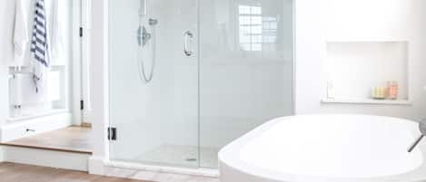 Bathtub, hair dryer, towels, soap