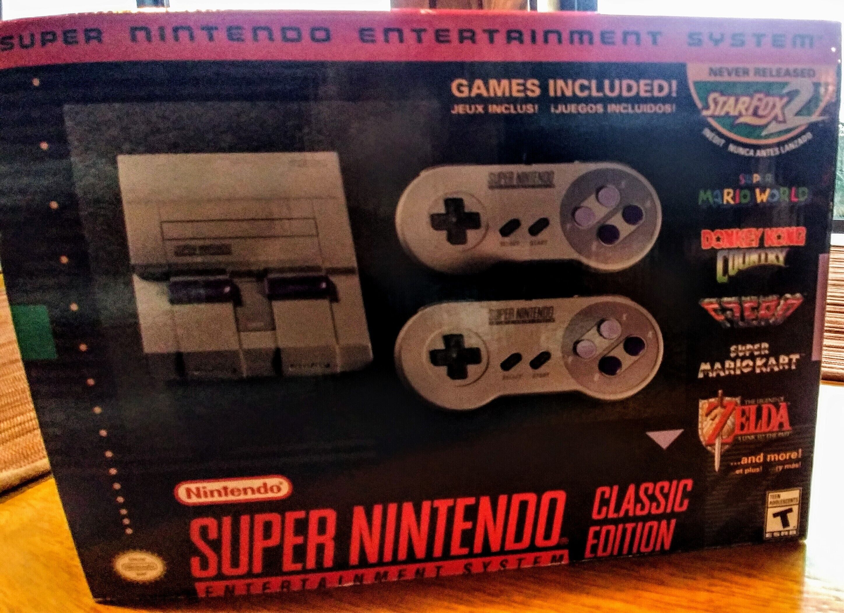 A Nintendo Super Nintendo Classic Edition console box with controllers.
