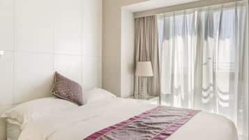 Suite Deluxe, 1 chambre | Bureau, rideaux dâobscurcissement, accĂšs au Wi-Fi (inclus)