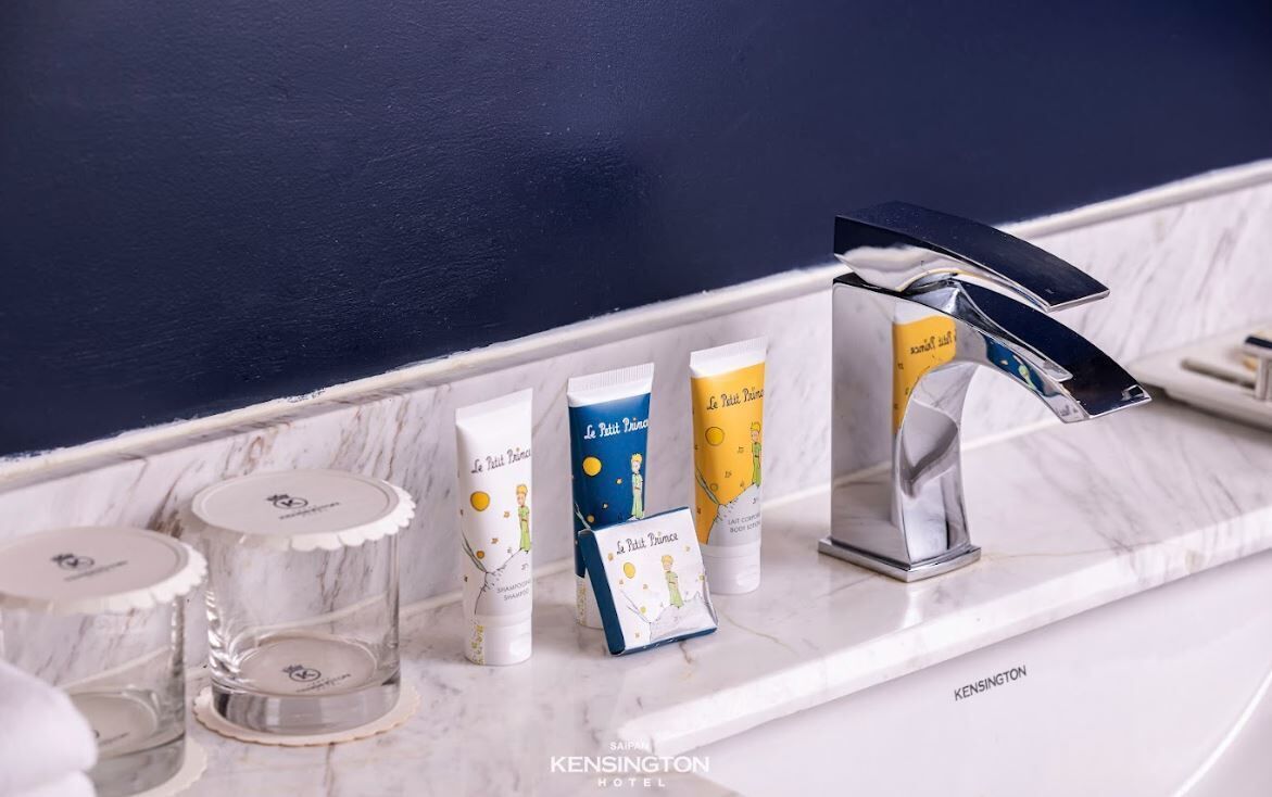 twin room, ocean view | bathroom | rainfall showerhead, designer toiletries, hair dryer, bathrobes