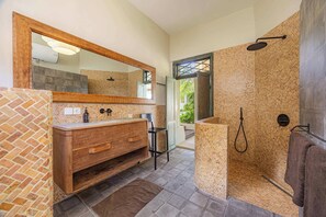 Bathtub, hair dryer, bidet, towels