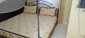 Comfort Double Room | Premium bedding, individually decorated, individually furnished, desk - Coronation Hotel (Hoima)