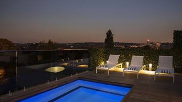Outdoor pool, pool umbrellas, pool loungers