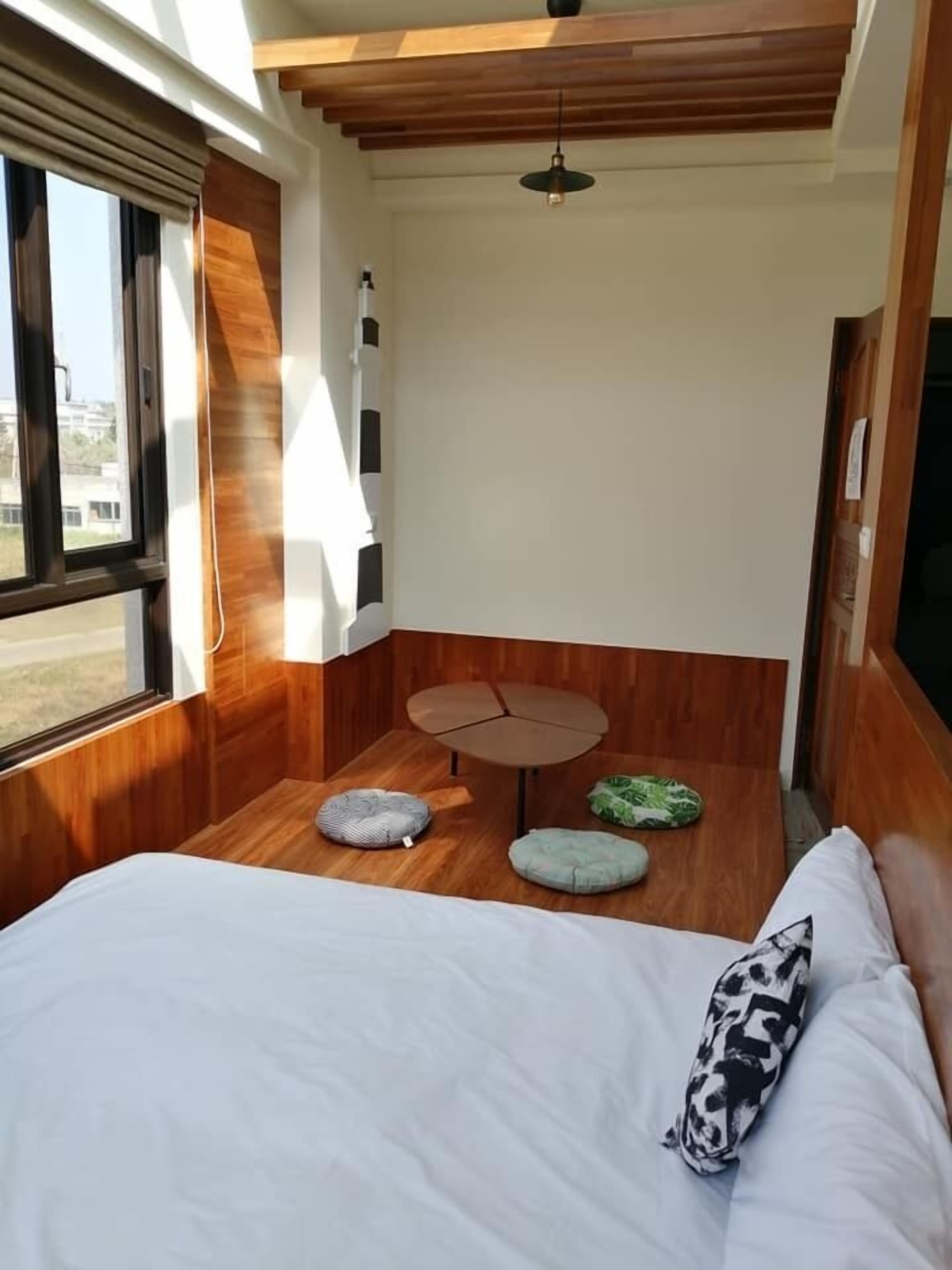 Senior Quadruple Room | Desk, blackout drapes, free WiFi, bed sheets