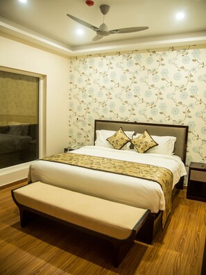 Blackout drapes, soundproofing, iron/ironing board, rollaway beds