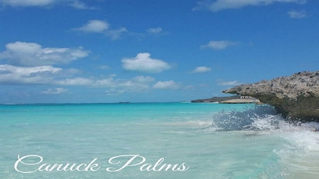 Beach nearby, sun loungers, beach towels. Modern vacation home with private yard, steps to the beach and centrally located