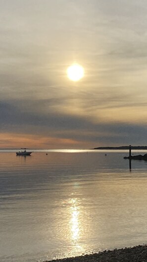 On the beach, sun loungers, beach towels