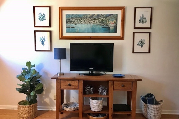 Cozy living room with coastal decor.