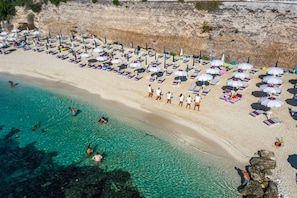 On the beach, sun loungers, beach umbrellas, beach bar - Villaggio Turistico Baia Del Monaco (Monte Sant'Angelo)