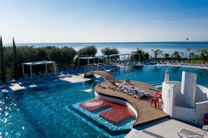 2 outdoor pools, open 9:00 AM to 7:00 PM, pool umbrellas, sun loungers