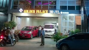 The exterior of the Golden Palace Hotel with illuminated signage and multiple levels. - Golden Palace Hotel Hpa An (Hpa-An)