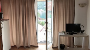Studio, Balcony | Living area | Flat-screen TV - Apartments Ivanisevic (Kotor)