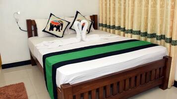 Chambre Simple, 1 lit une place, accessible aux personnes à mobilité réduite, vue jardin | Climatisation