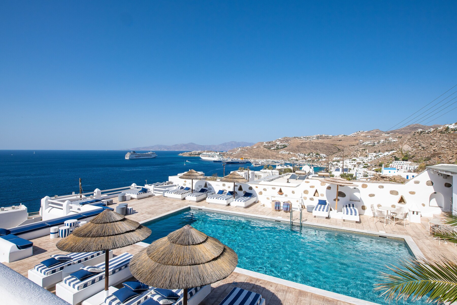 Outdoor pool, pool umbrellas, pool loungers