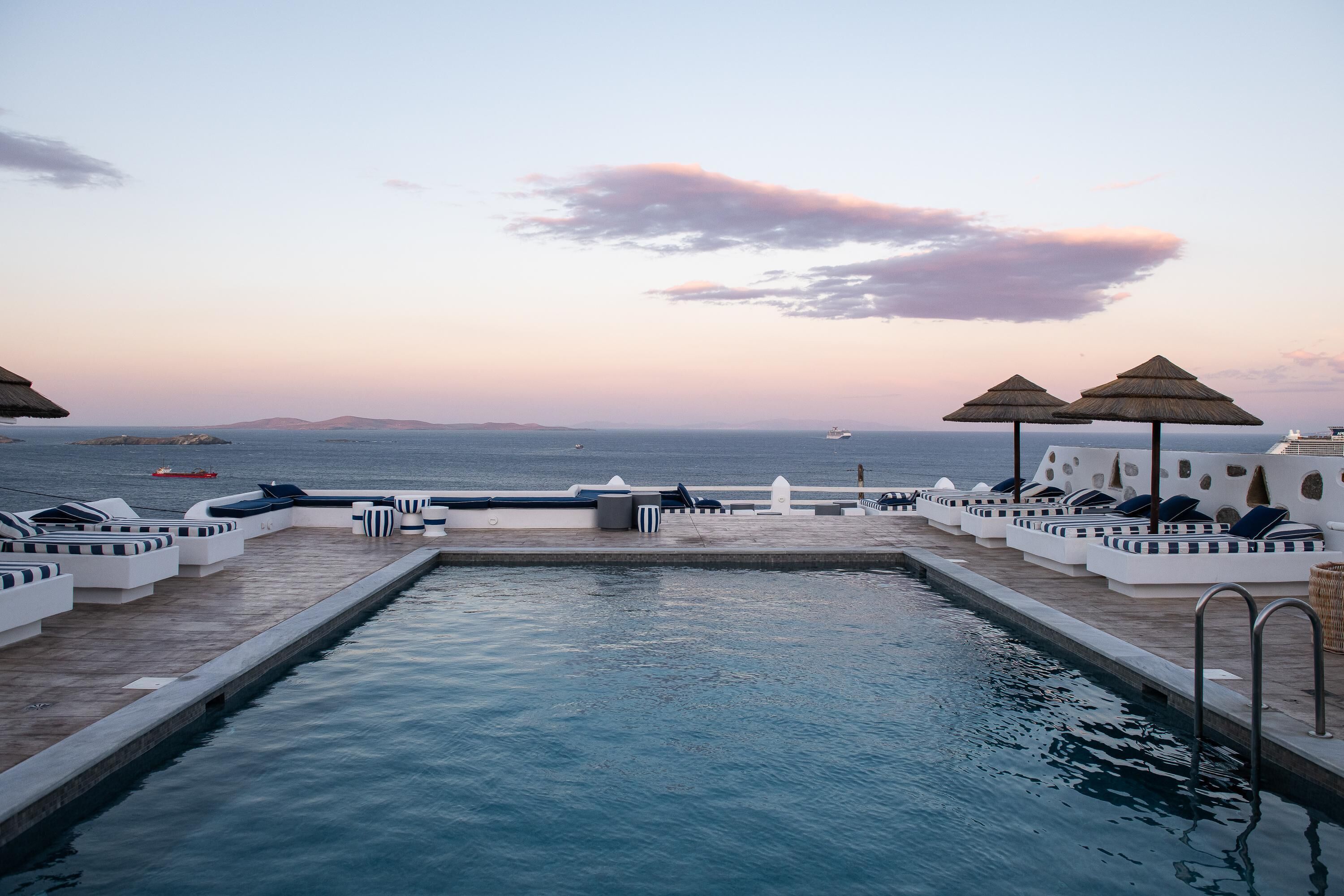 Outdoor pool, pool umbrellas, sun loungers