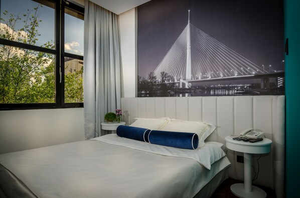 Premium bedding, in-room safe, individually decorated, desk