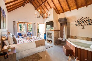 Luxury Suite, Jetted Tub | Pillowtop beds, minibar, laptop workspace, blackout drapes