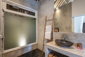 A modern bathroom with a glass-enclosed shower, a wooden ladder, a large basin sink, and a mirror above the sink. - Renovated Villa Zayya, Central Oberoi Seminyak (Seminyak)