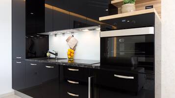 Apartment, 2 Bedrooms | Private kitchen | Fridge, oven, stovetop, dishwasher