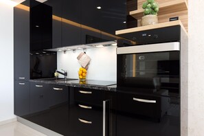 Apartment, 2 Bedrooms | Private kitchen | Fridge, oven, stovetop, dishwasher