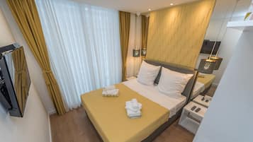Desk, blackout drapes, soundproofing, free cribs/infant beds