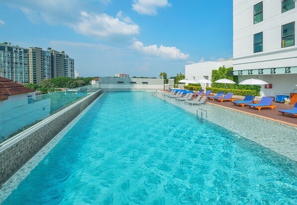 Outdoor pool, open 8:00 AM to 8:00 PM, pool umbrellas, pool loungers